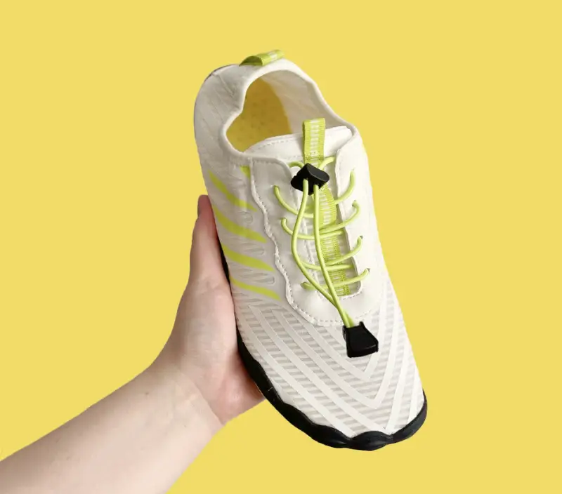 Hand Holding Grounded Shoe